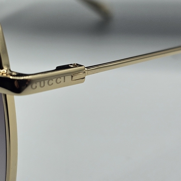 Gucci GG1030SK-003-60 Gold Sunglasses With earring accessories - Picture 13 of 16